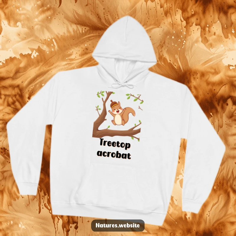 Funny hoodie depicting a joyful squirrel in an acorn cap leaping between branches, perfect for cozy, active wear.